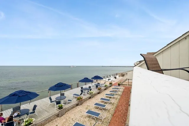 a terrace with a table and chairs