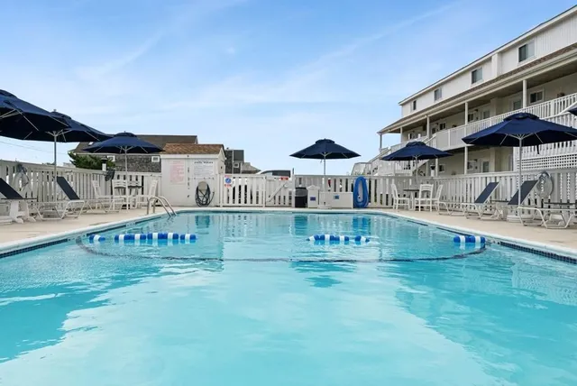 a view of a house with swimming pool