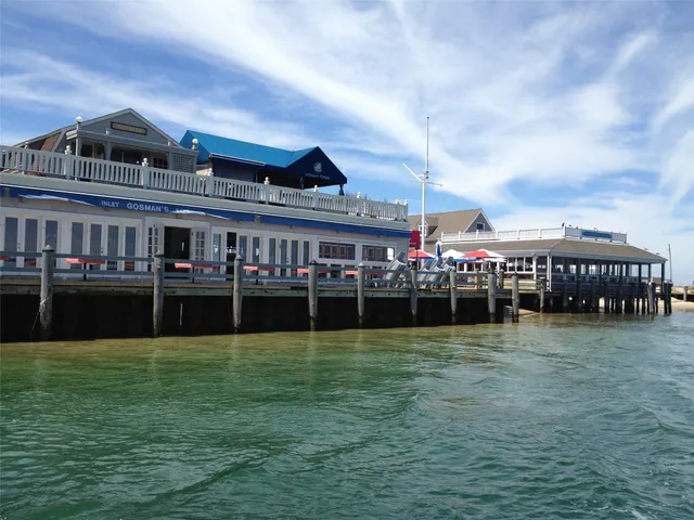 a swimming pool view with a lake view