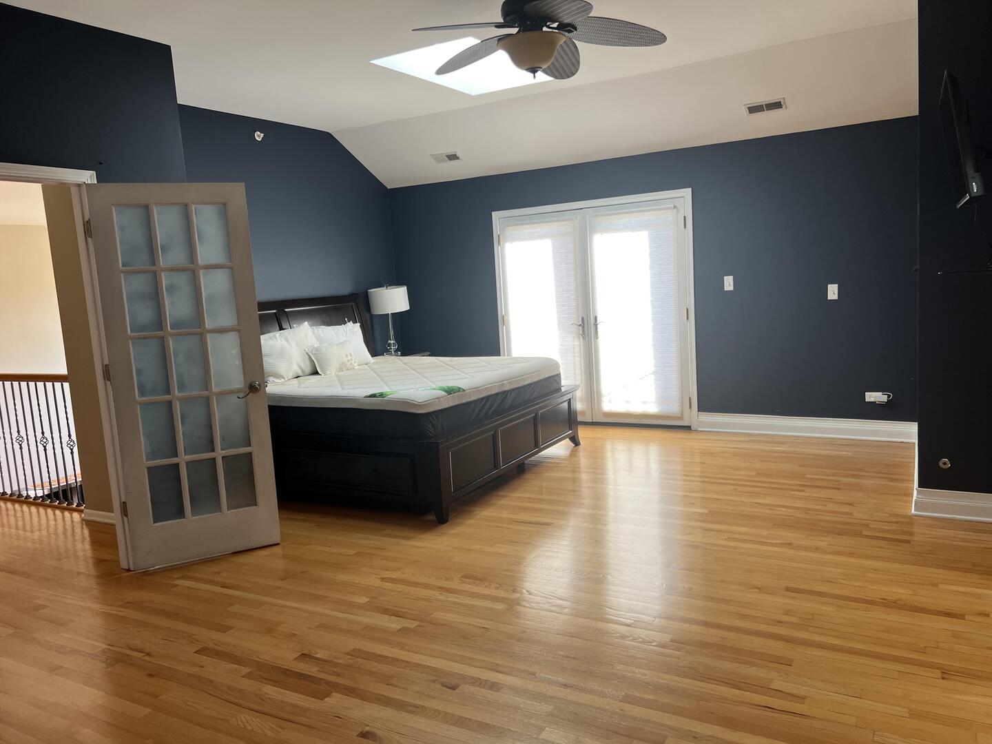 4429 203rd Street Matteson, IL 60443 - Photo 16 of 29 a bedroom with a bed and a large window