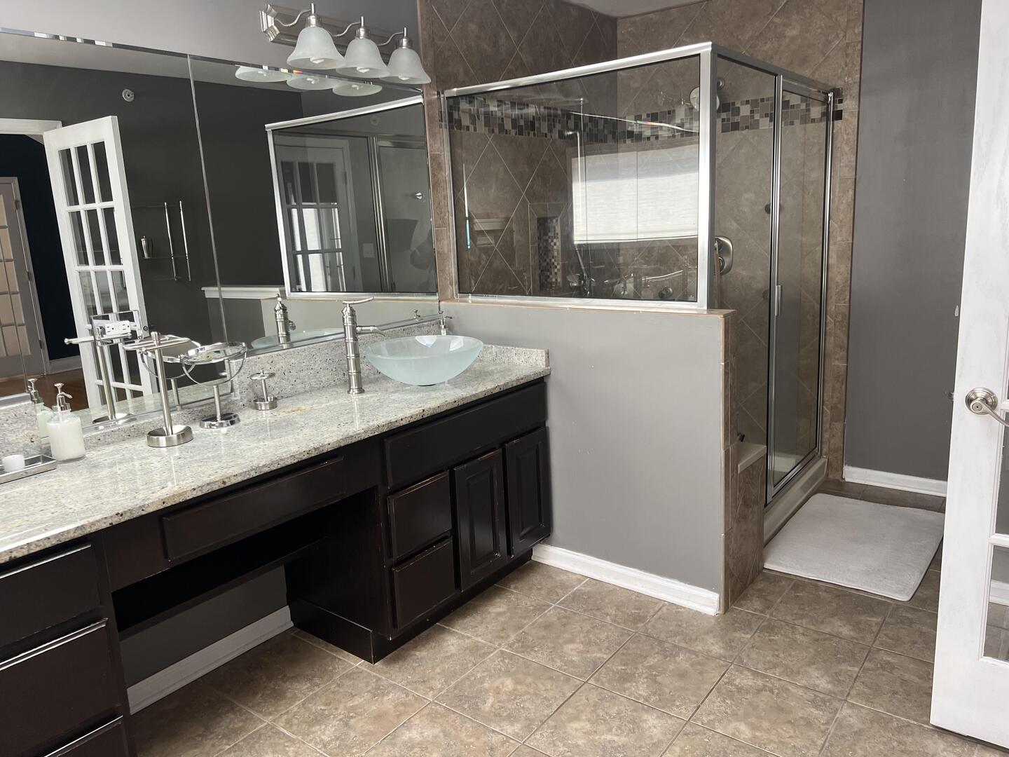 4429 203rd Street Matteson, IL 60443 - Photo 18 of 29 a bathroom with a double vanity sink and mirror
