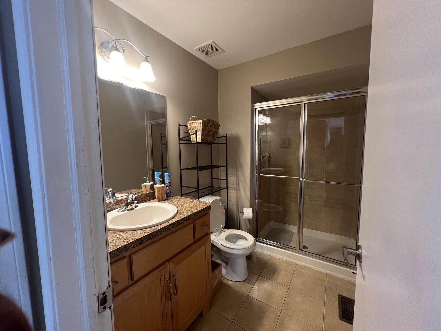 4429 203rd Street Matteson, IL 60443 - Photo 5 of 29 a bathroom with a granite countertop sink toilet and shower
