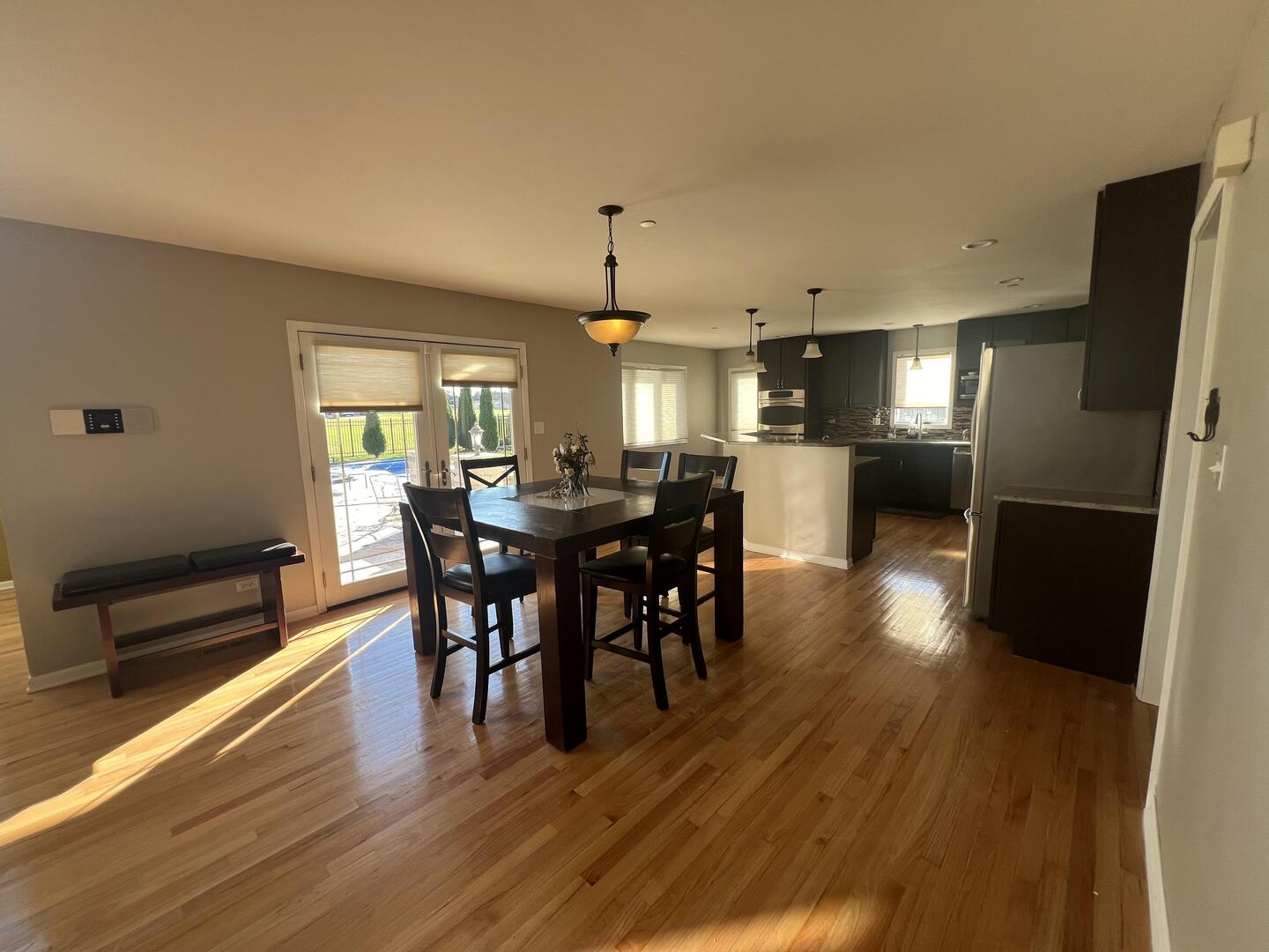 4429 203rd Street Matteson, IL 60443 - Photo 9 of 29 a view of a dining room with furniture window and wooden floor