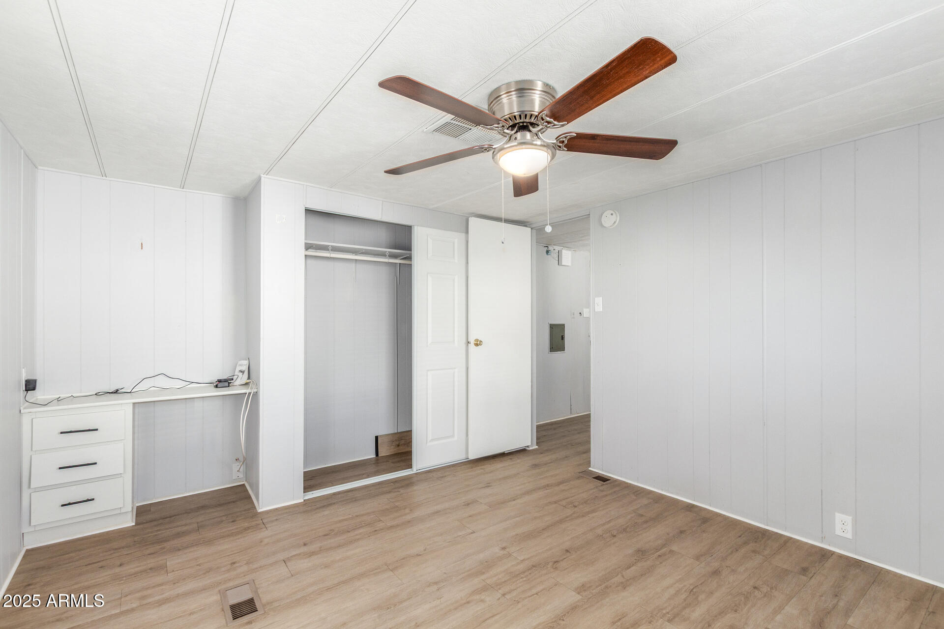16225 North Cave Creek Road, Unit 140 Phoenix, AZ 85032 - Photo 18 of 32 wooden floor in an empty room