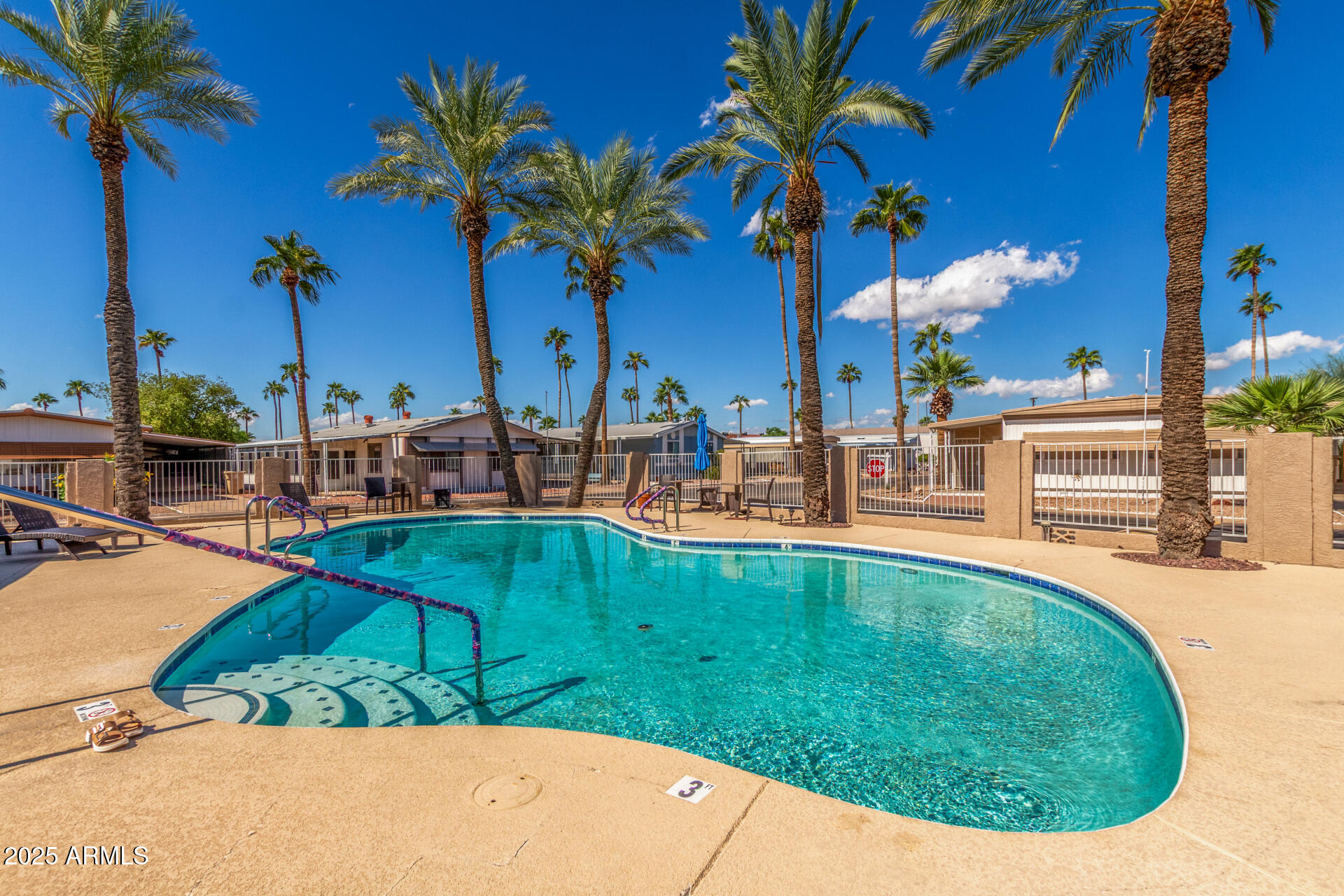16225 North Cave Creek Road, Unit 140 Phoenix, AZ 85032 - Photo 28 of 32 a view of a swimming pool with a patio