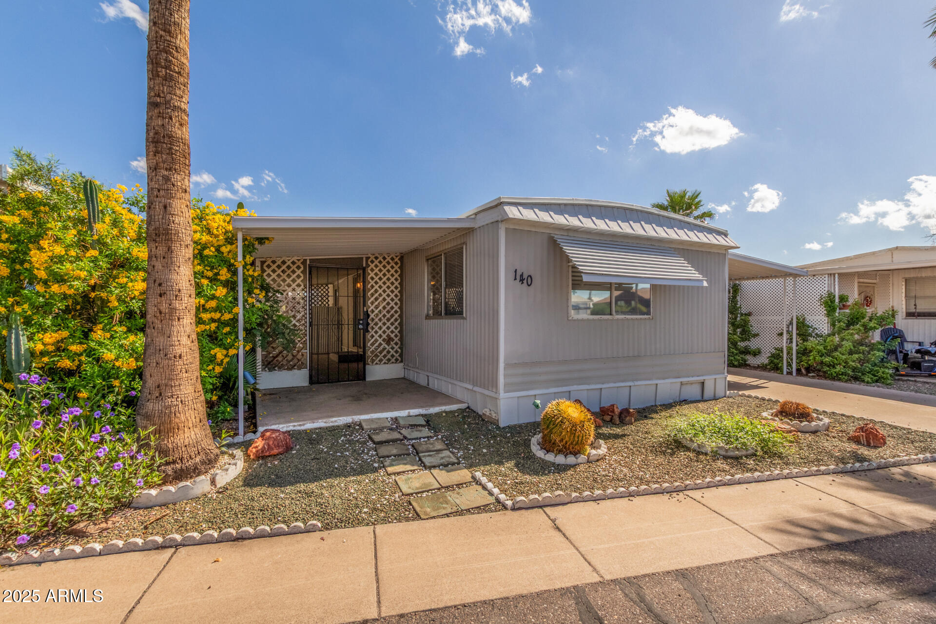 16225 North Cave Creek Road, Unit 140 Phoenix, AZ 85032 - Photo 3 of 32 a view of a porch