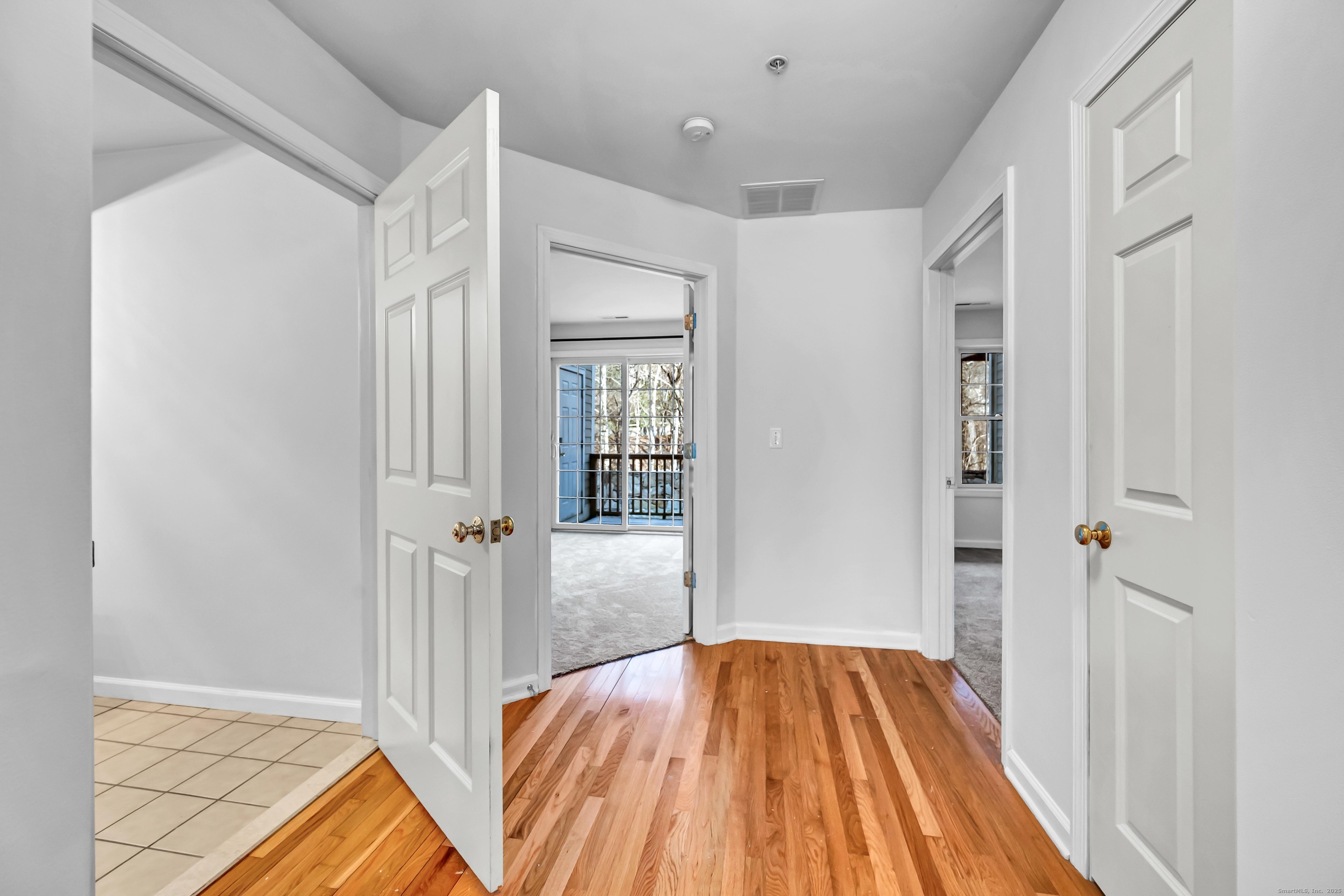 793 Federal Road, Unit 3 Brookfield, CT 06804 - Photo 14 of 30 a view of a hallway with wooden floor and closet