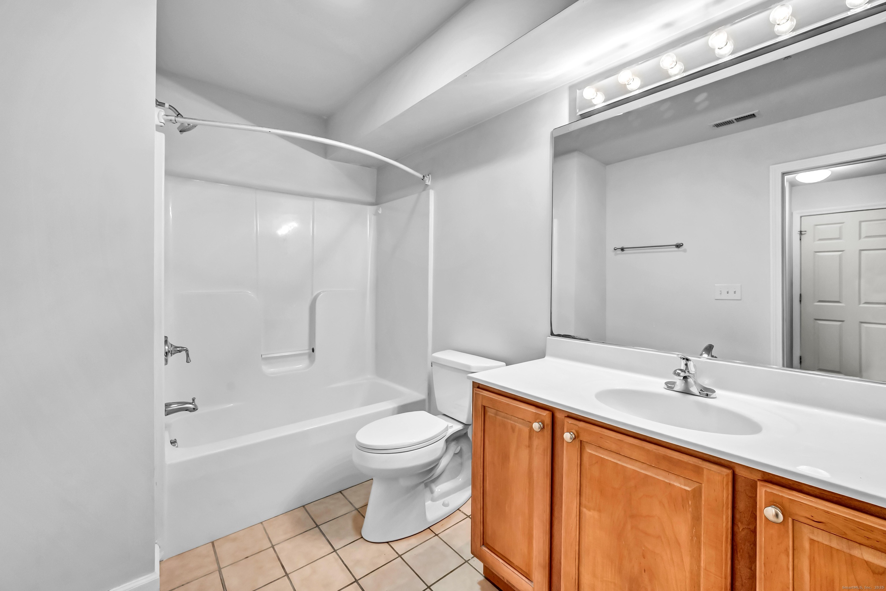 793 Federal Road, Unit 3 Brookfield, CT 06804 - Photo 16 of 30 a bathroom with a sink toilet and shower