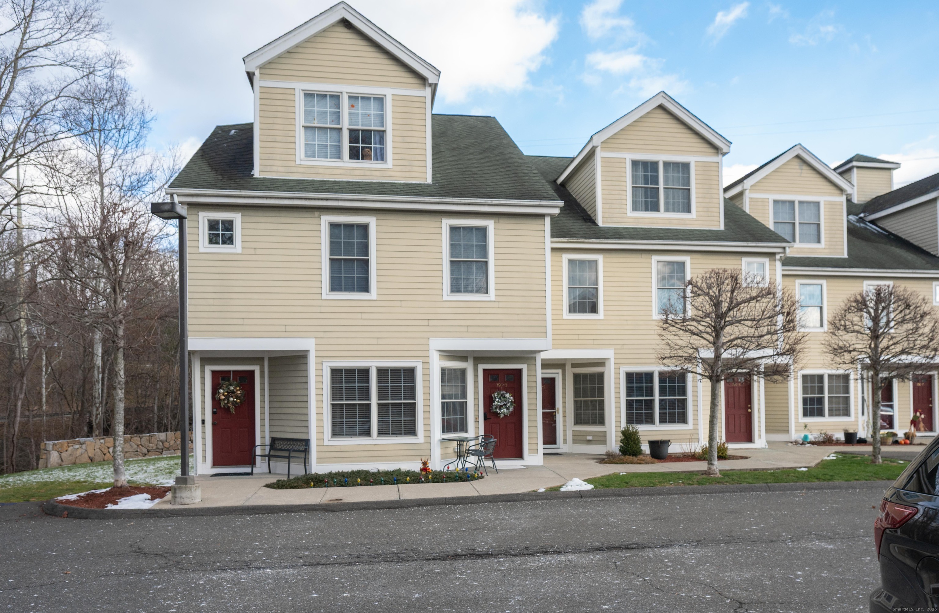 793 Federal Road, Unit 3 Brookfield, CT 06804 - Photo 2 of 30 a front view of a house with a yard