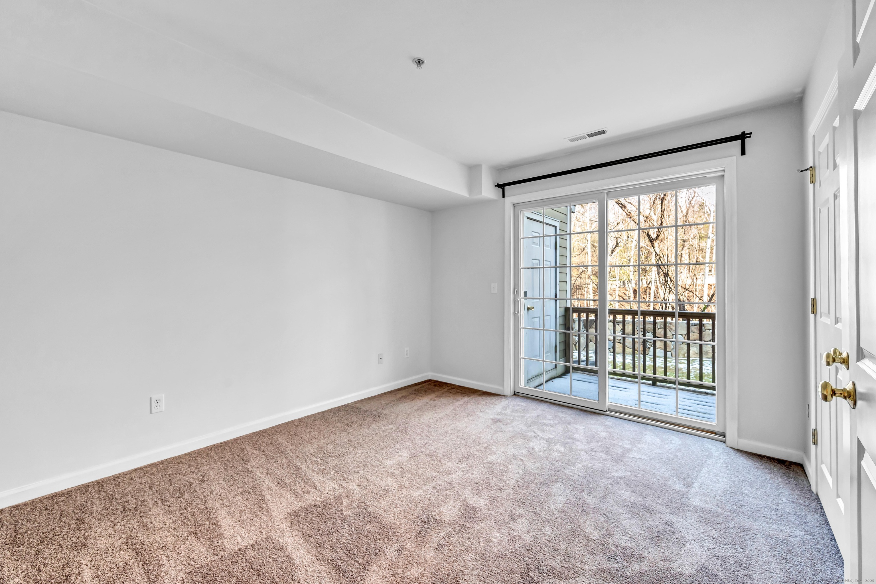 793 Federal Road, Unit 3 Brookfield, CT 06804 - Photo 21 of 30 a view of an empty room with a window