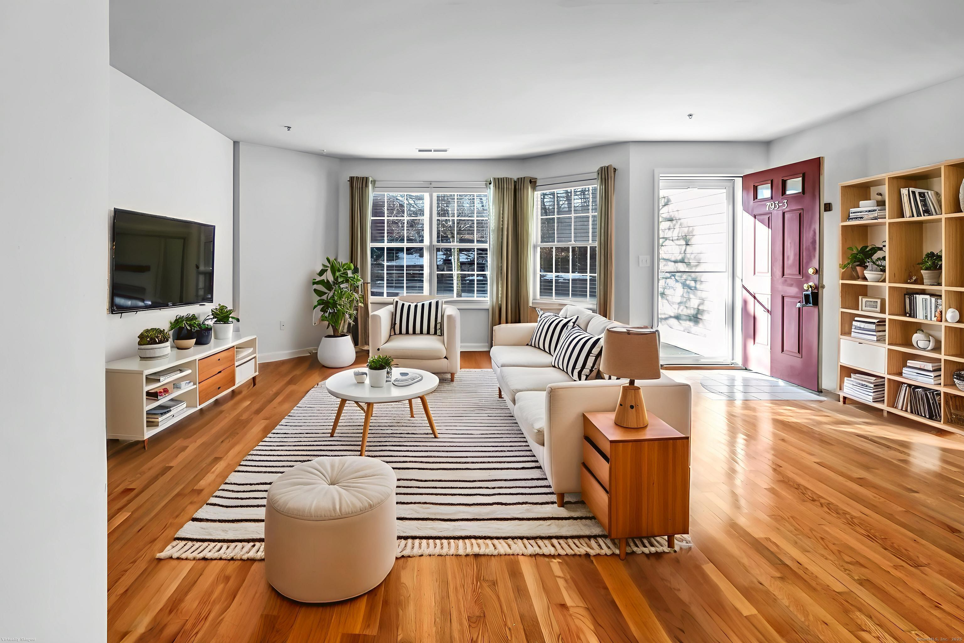 793 Federal Road, Unit 3 Brookfield, CT 06804 - Photo 4 of 30 a living room with furniture and a flat screen tv