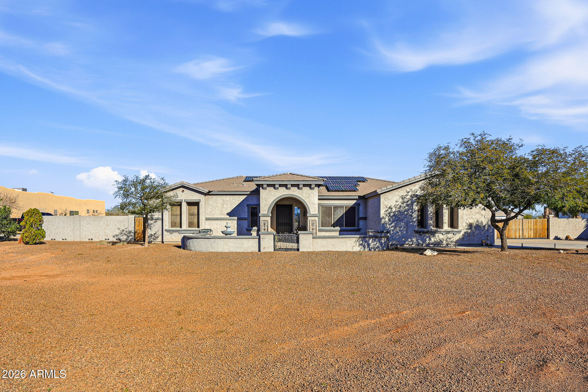 23024 West Sierra Ridge Way Wittmann, AZ 85361 - Photo 6 of 99 a view of a house with a yard