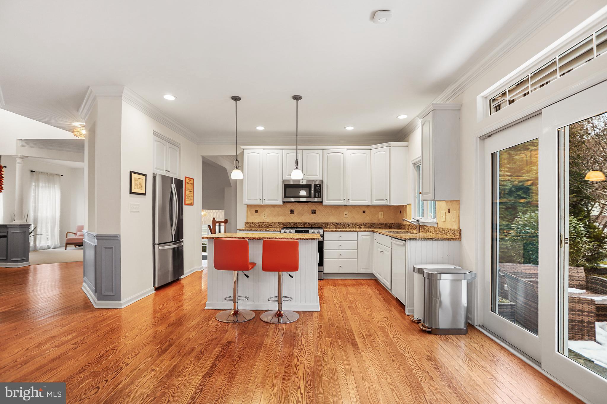 59 Huntingdon Farm Drive Glen Mills, PA 19342 - Photo 7 of 36 Modern kitchen with sleek design and warmth.