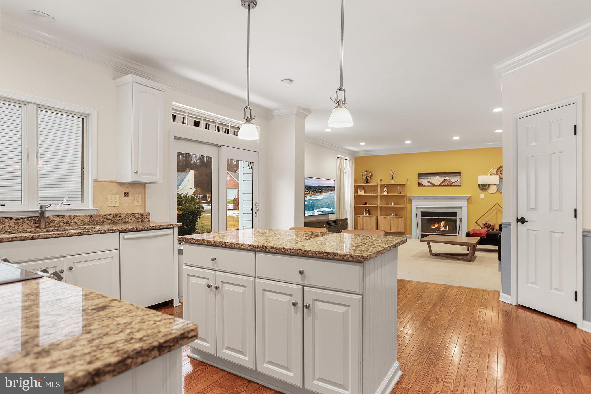 59 Huntingdon Farm Drive Glen Mills, PA 19342 - Photo 8 of 36 Bright and inviting open-concept kitchen.