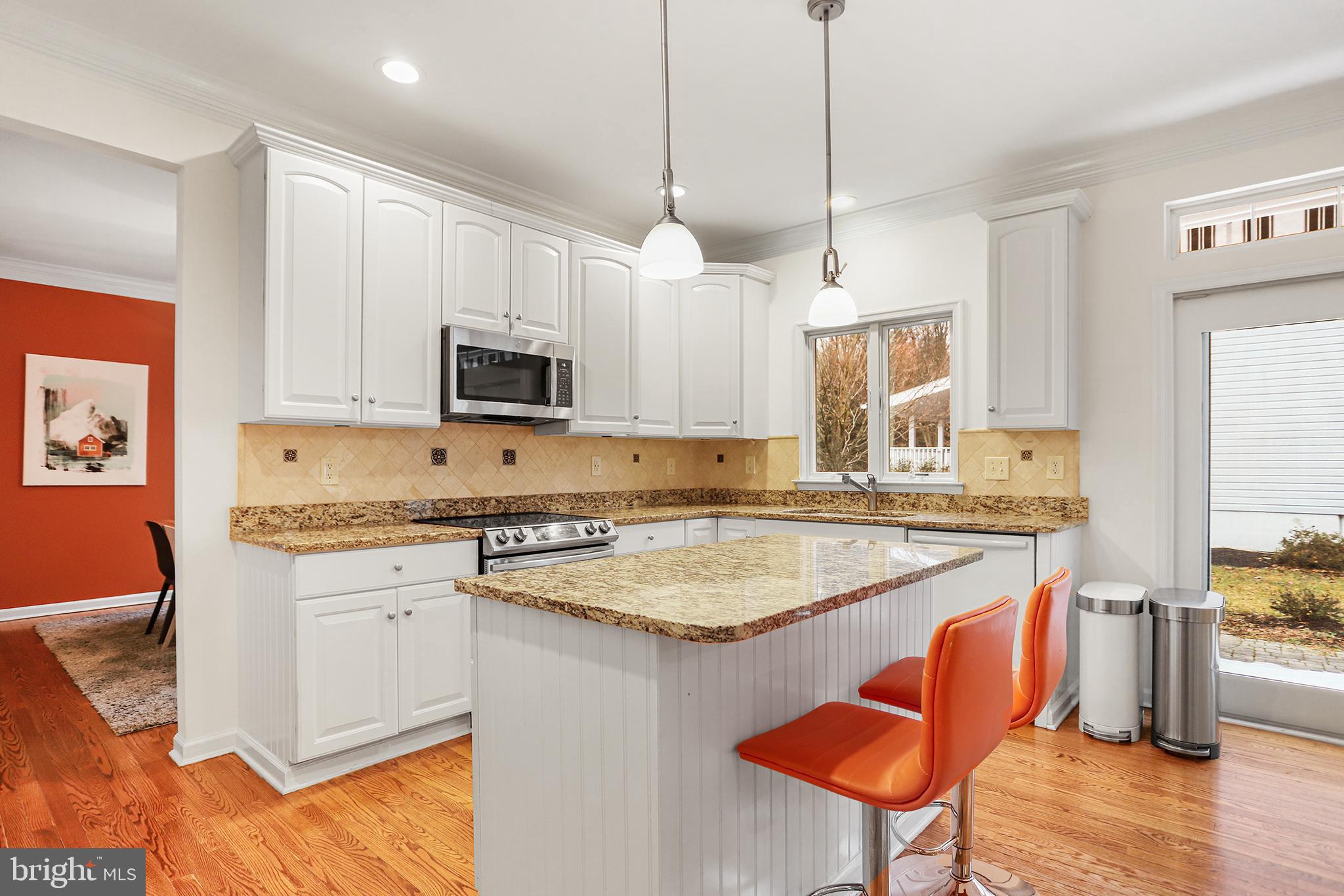 59 Huntingdon Farm Drive Glen Mills, PA 19342 - Photo 9 of 36 Modern kitchen with vibrant accents.
