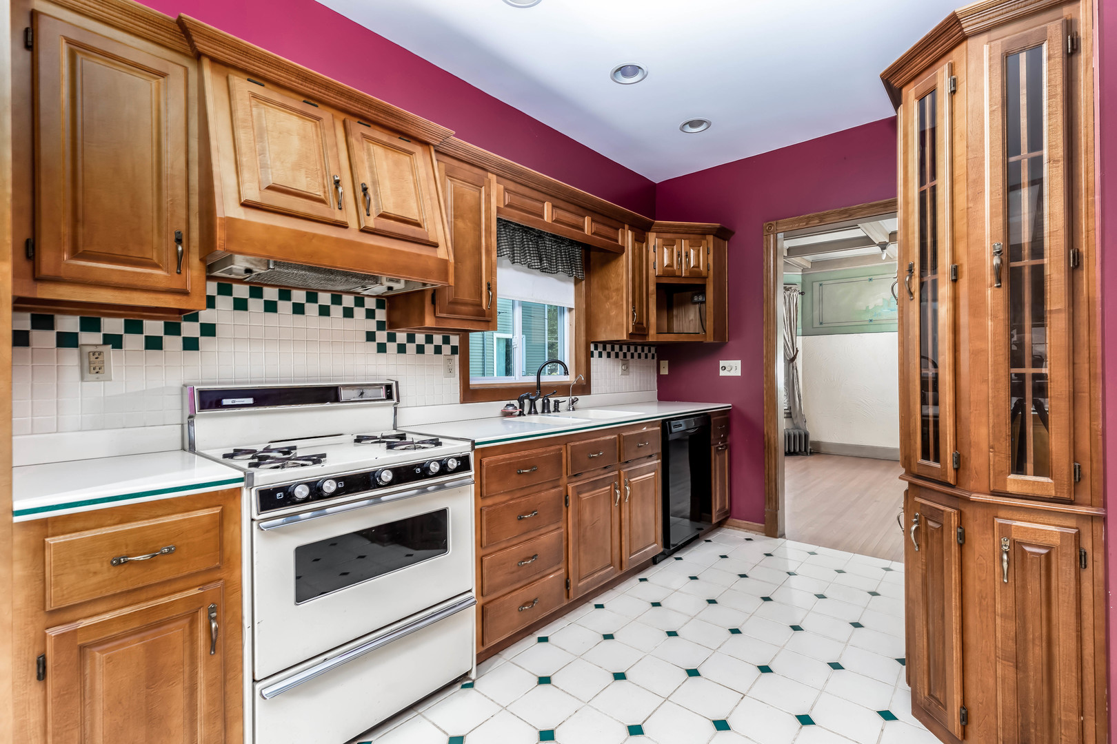 809 Ottawa Avenue Ottawa, IL 61350 - Photo 11 of 39 a kitchen with stainless steel appliances a stove a sink and a refrigerator