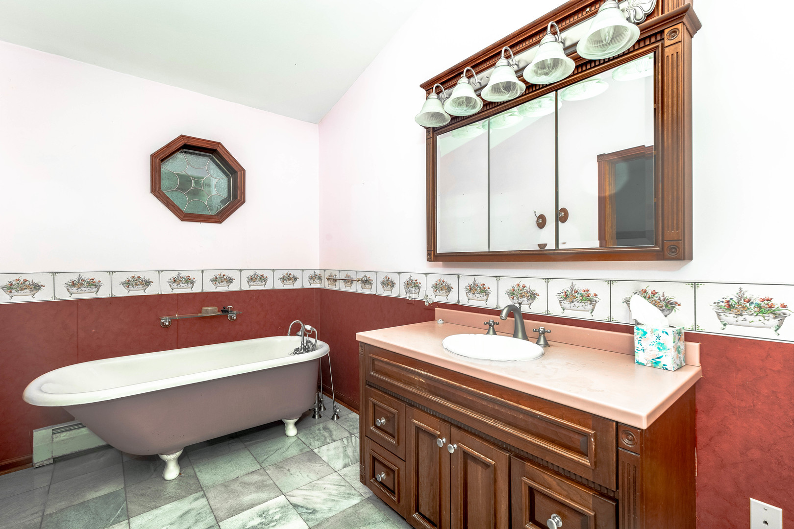 809 Ottawa Avenue Ottawa, IL 61350 - Photo 18 of 39 a bathroom with a sink and a mirror