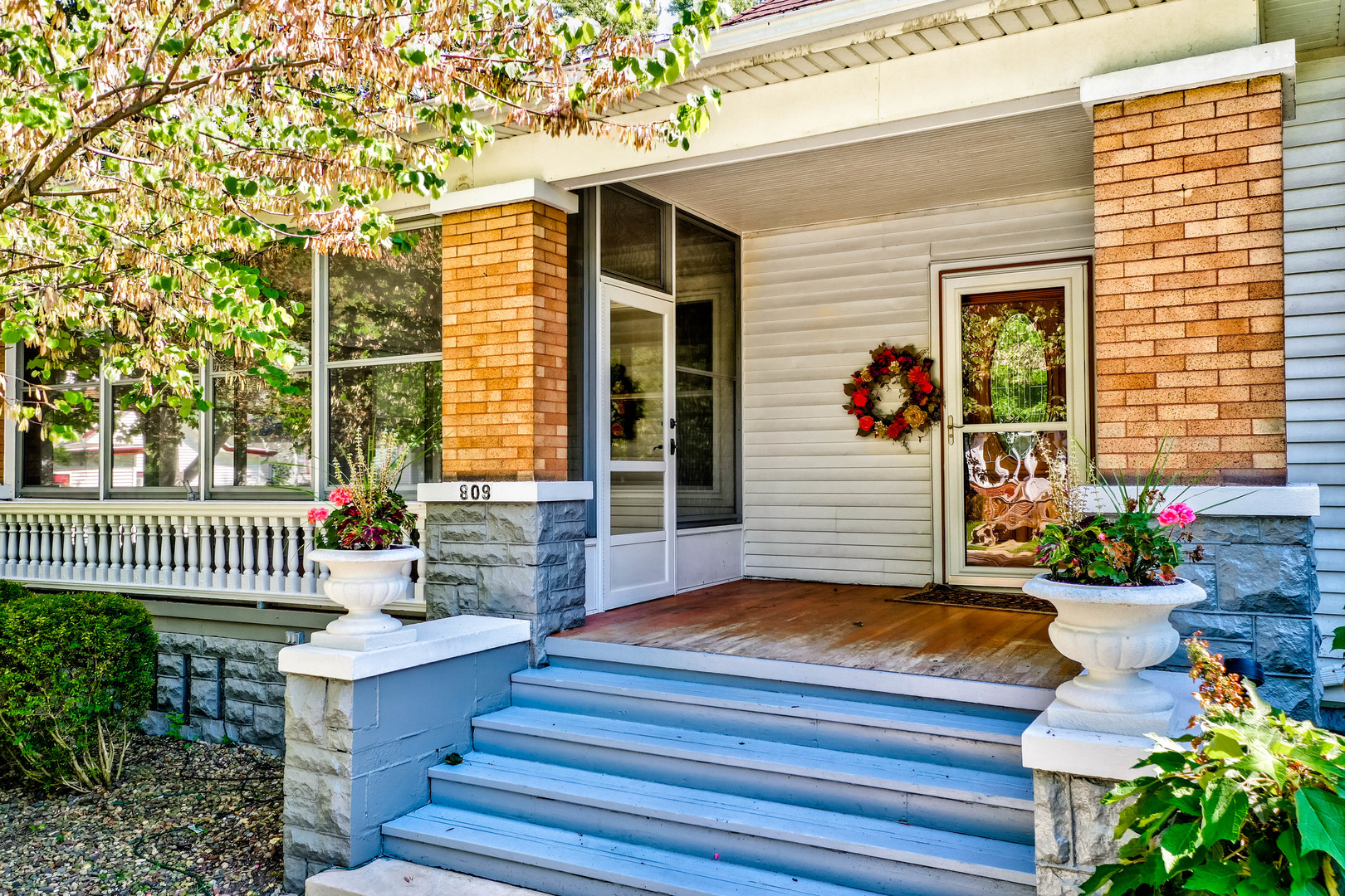 809 Ottawa Avenue Ottawa, IL 61350 - Photo 2 of 39 a view of a house with a small yard and wooden floor and fence