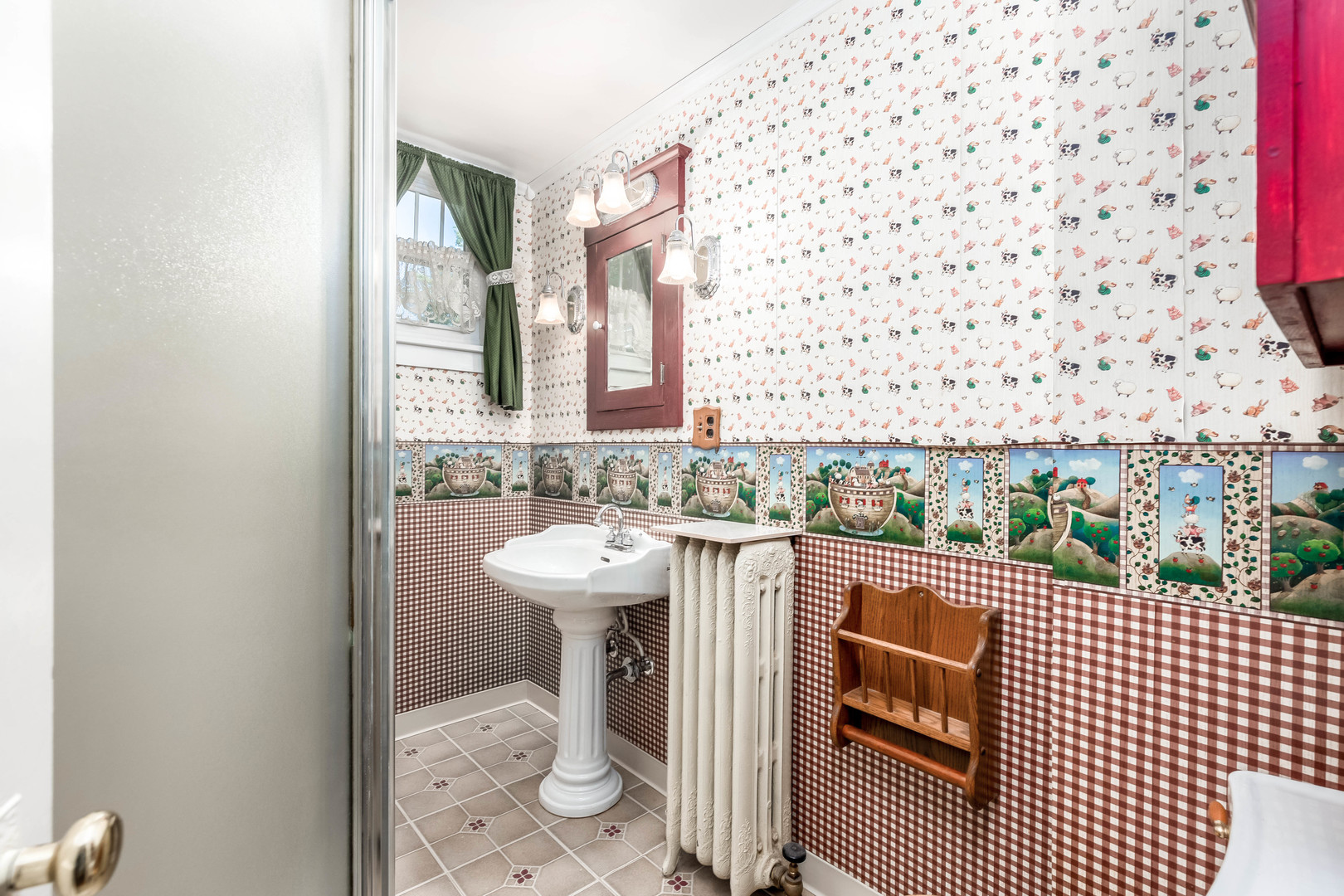 809 Ottawa Avenue Ottawa, IL 61350 - Photo 23 of 39 a bathroom with a sink a toilet and mirror