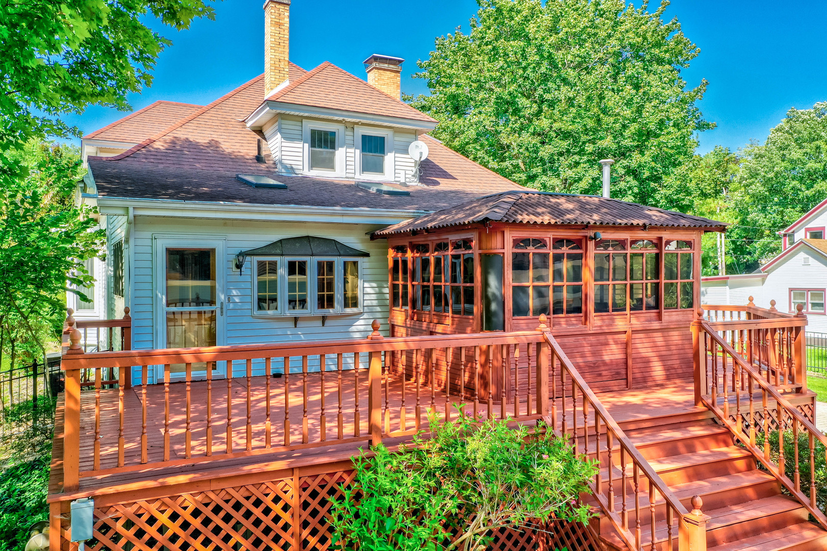 809 Ottawa Avenue Ottawa, IL 61350 - Photo 32 of 39 a view of a house with a deck and a garden