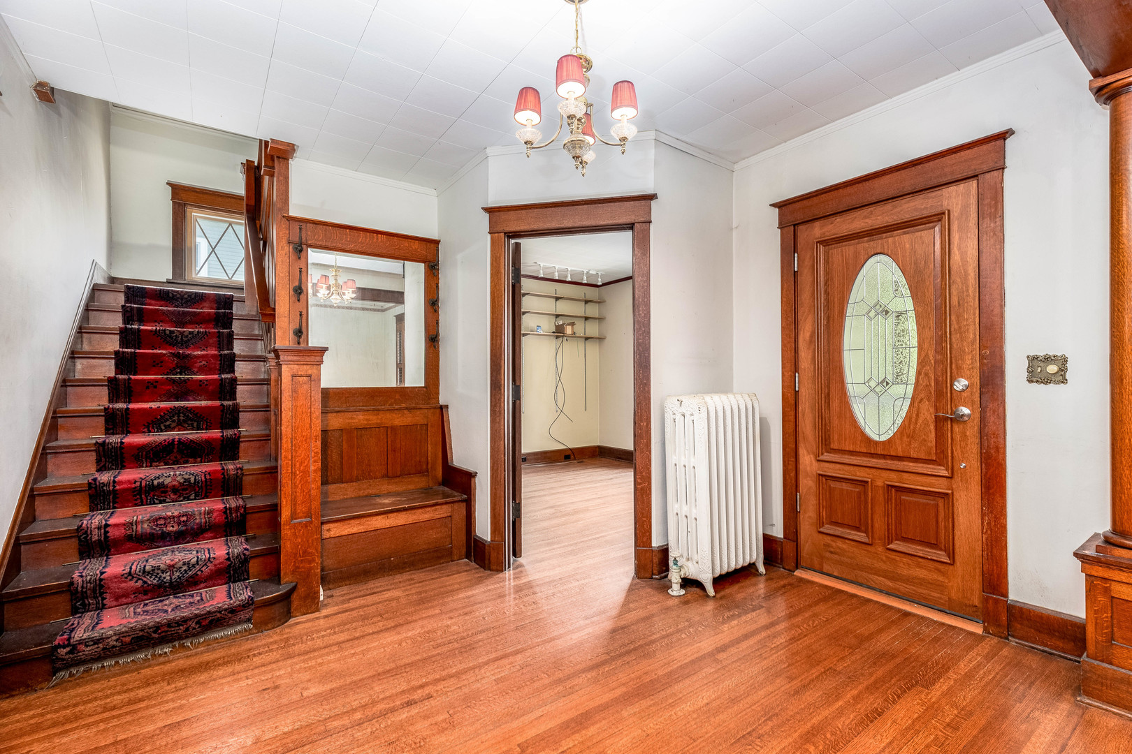 809 Ottawa Avenue Ottawa, IL 61350 - Photo 4 of 39 wooden floor in an empty room with a mirror