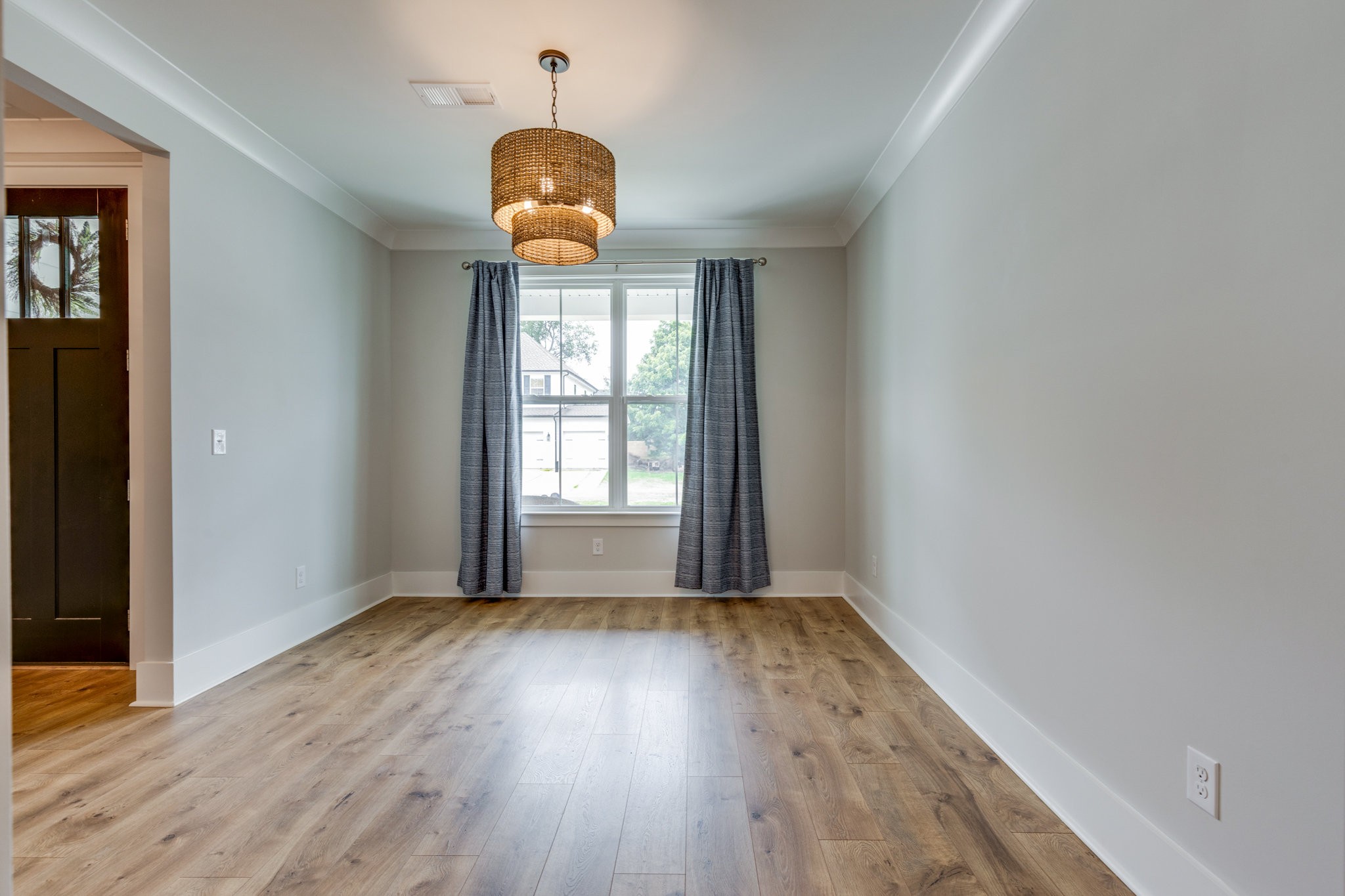 2110 Lequire Lane Spring Hill, TN 37174 - Photo 24 of 76 an empty room with wooden floor and window