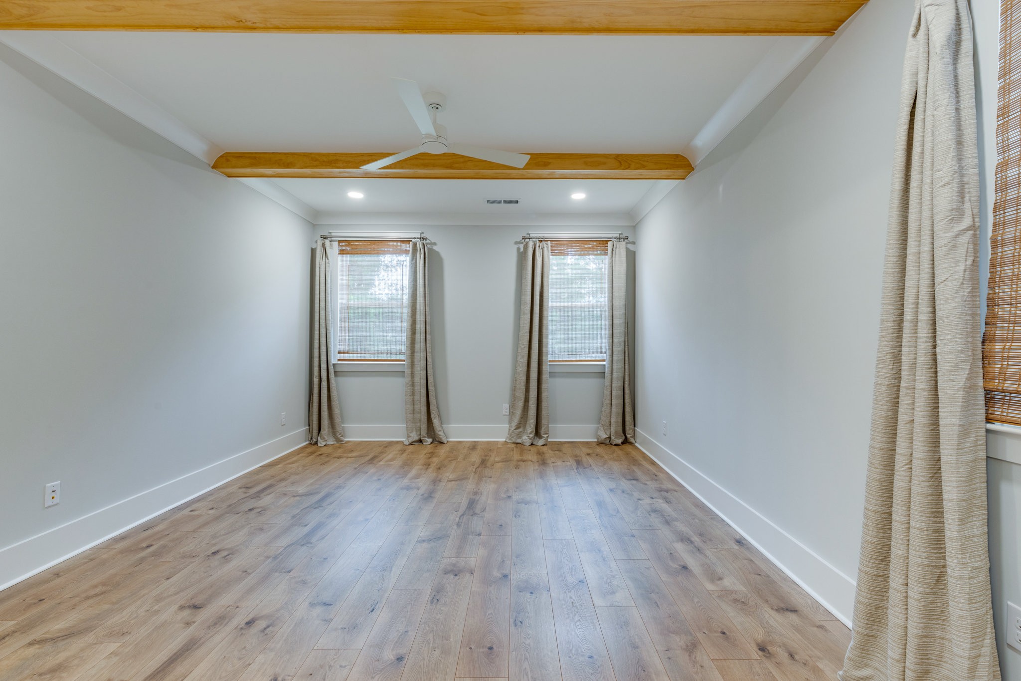 2110 Lequire Lane Spring Hill, TN 37174 - Photo 25 of 76 a view of an empty room with wooden floor and a window
