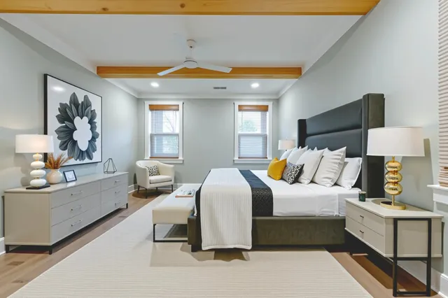 a front view of house with a garden and patio