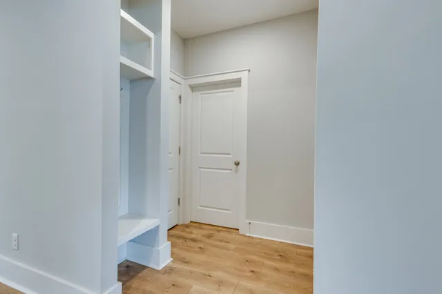 a aerial view of multiple houses with yard