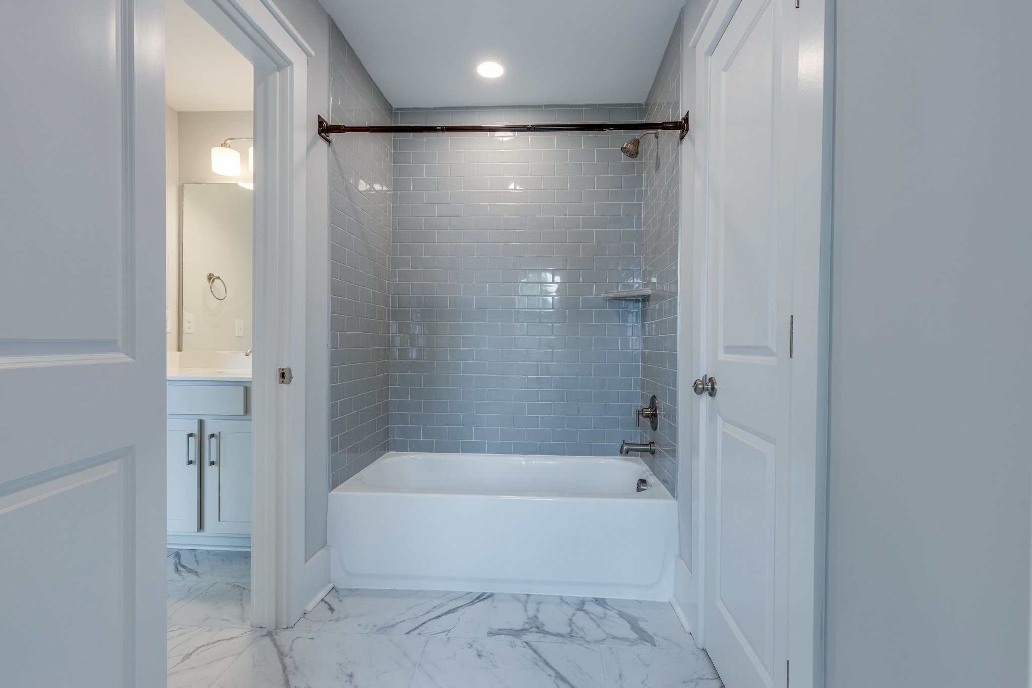 2110 Lequire Lane Spring Hill, TN 37174 - Photo 40 of 76 a bathroom with a bathtub and a shower