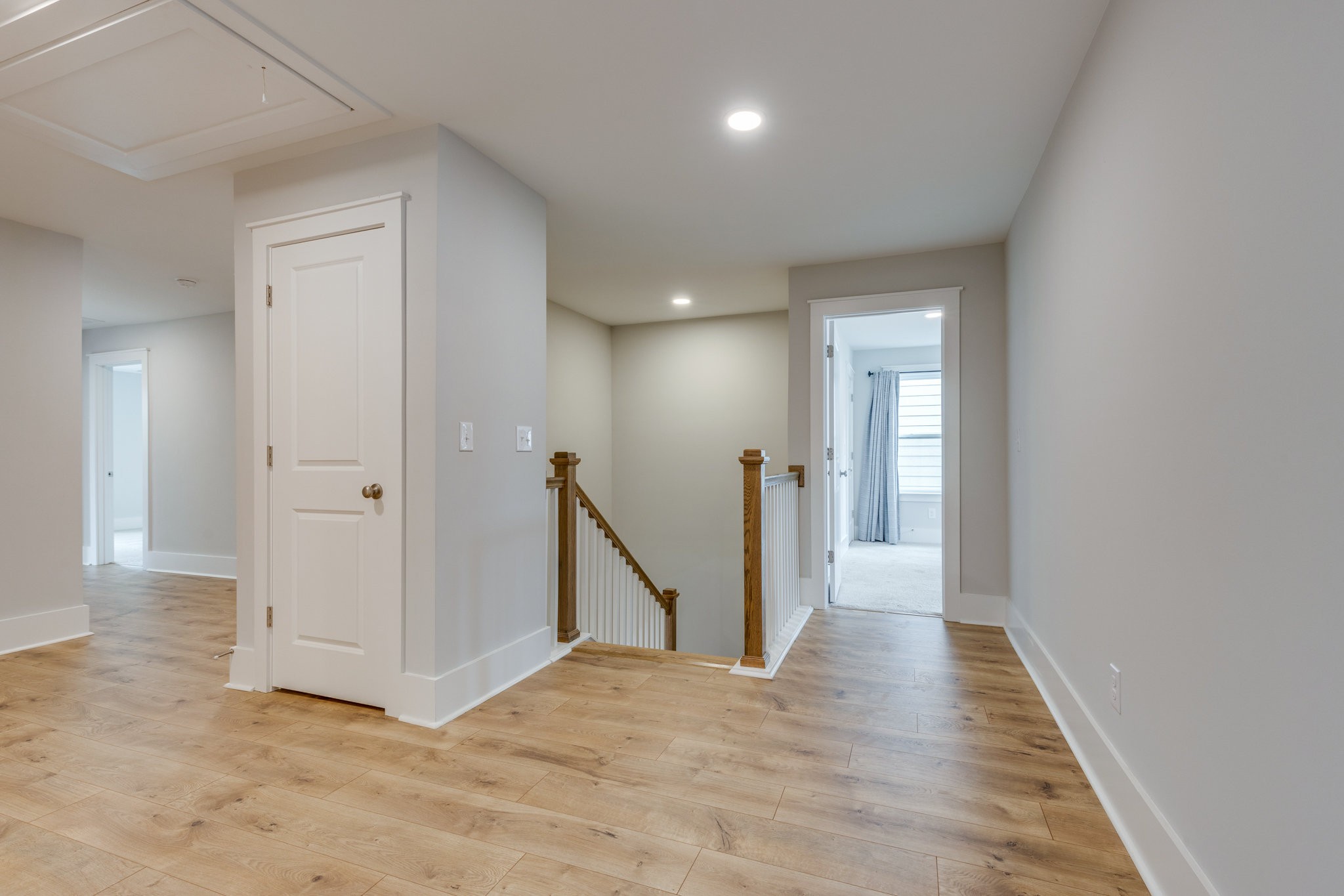 2110 Lequire Lane Spring Hill, TN 37174 - Photo 44 of 76 a view of a hallway with wooden floor