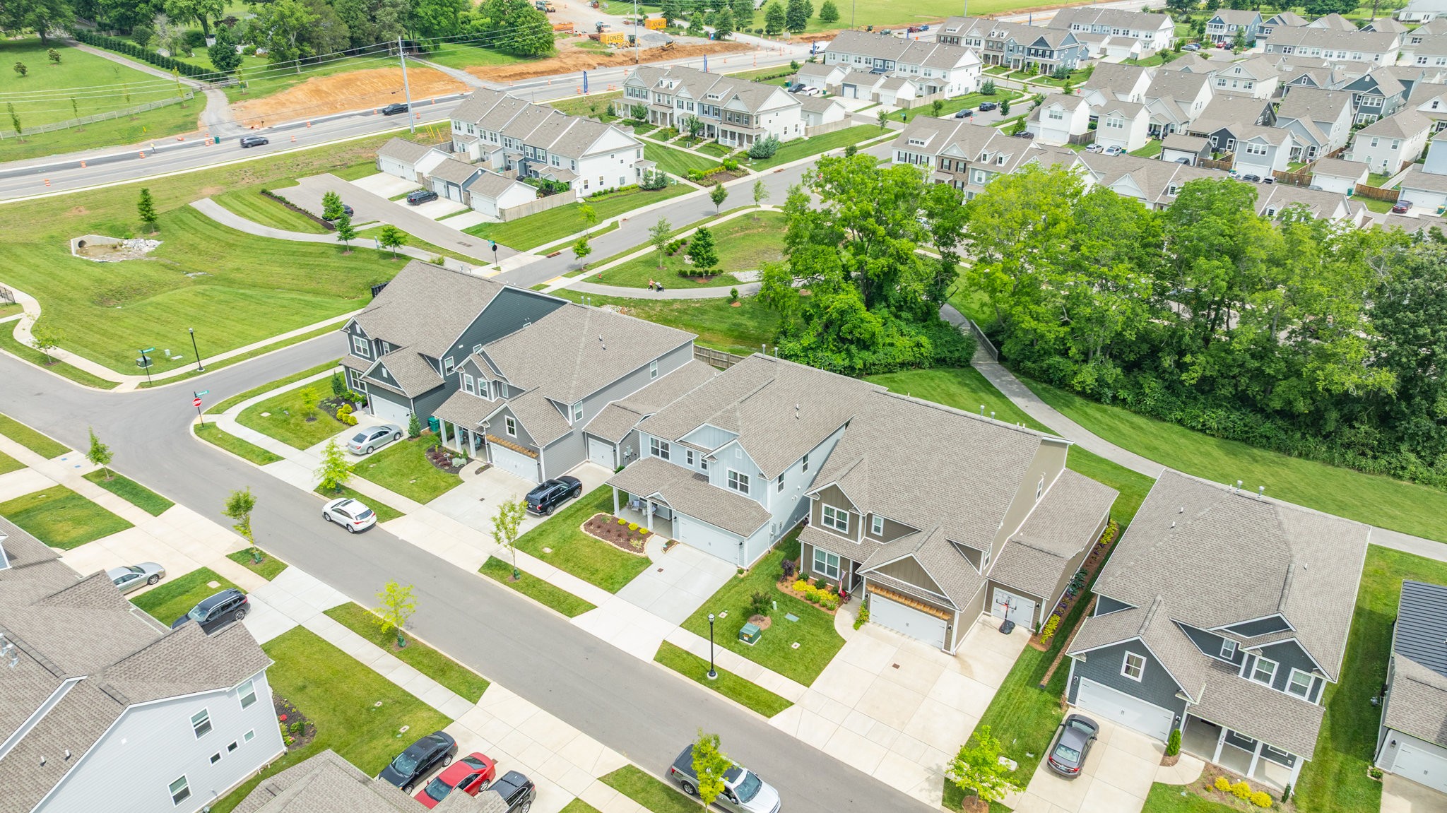 2110 Lequire Lane Spring Hill, TN 37174 - Photo 73 of 76 an aerial view of a house with a garden and trees