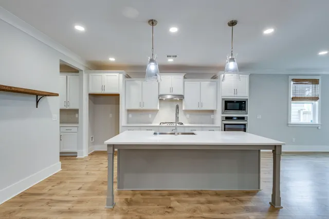 a view of kitchen and utility room