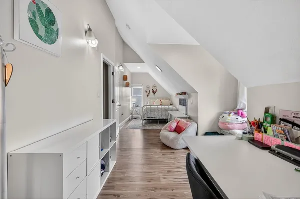 a hallway with wooden floor
