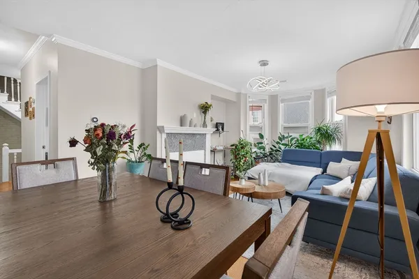 a view of a livingroom with furniture and a table