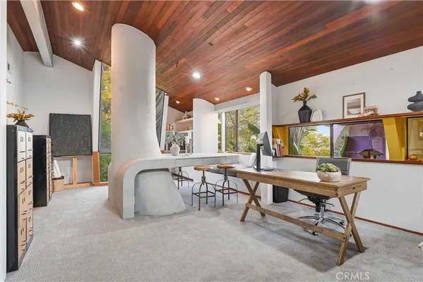 a bedroom with a bed and a cabinets