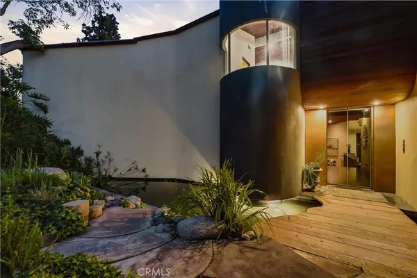 a picture of a bathroom with a glass shower door