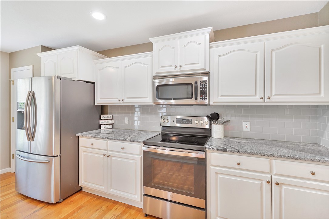 131 Morgan Road West Union, SC 29696 - Photo 8 of 39 Brightly lit kitchen boasts sleek stainless steel appliances and ample counter space.