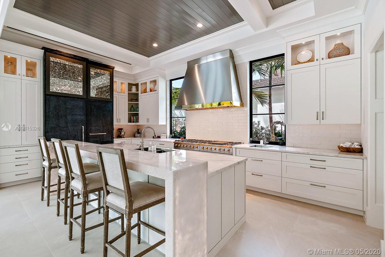 220 Commodore Drive Jupiter, FL 33477 - Photo 20 of 55 a view of a dining room with furniture and window