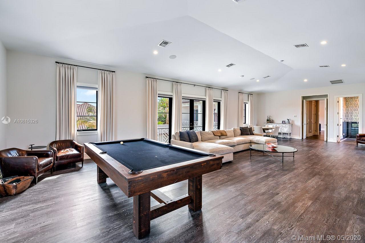 220 Commodore Drive Jupiter, FL 33477 - Photo 30 of 55 a living room with furniture a rug and a window