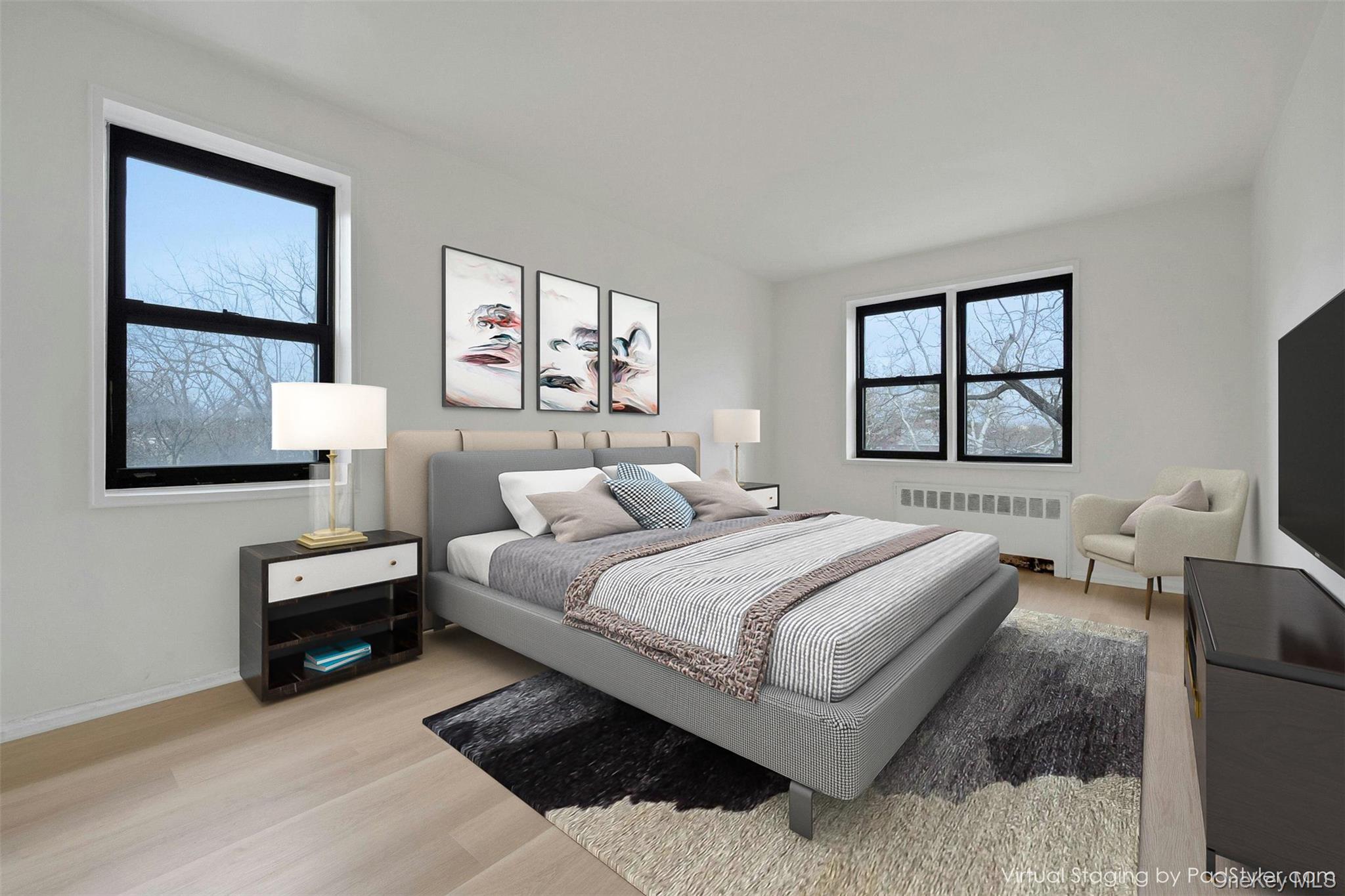 620 Pelham Road, Unit 6J New Rochelle, NY 10805 - Photo 10 of 26 a bedroom with a bed and a painting on the wall