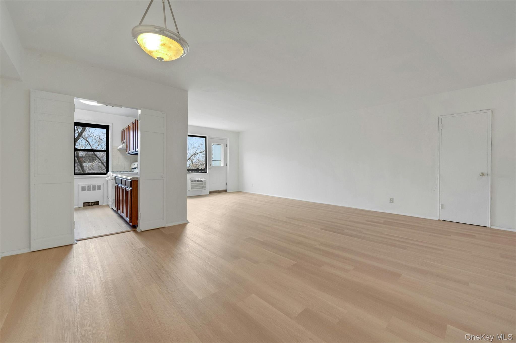 620 Pelham Road, Unit 6J New Rochelle, NY 10805 - Photo 4 of 26 a view of empty room with wooden floor