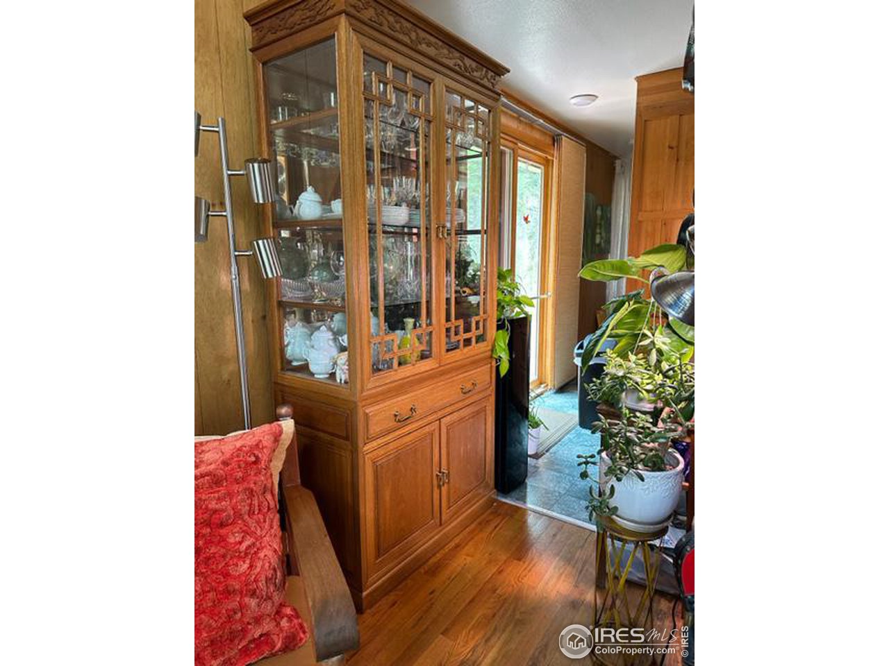 702 Riverside Drive Lyons, CO 80540 - Photo 4 of 19 a living room with furniture and a potted plant