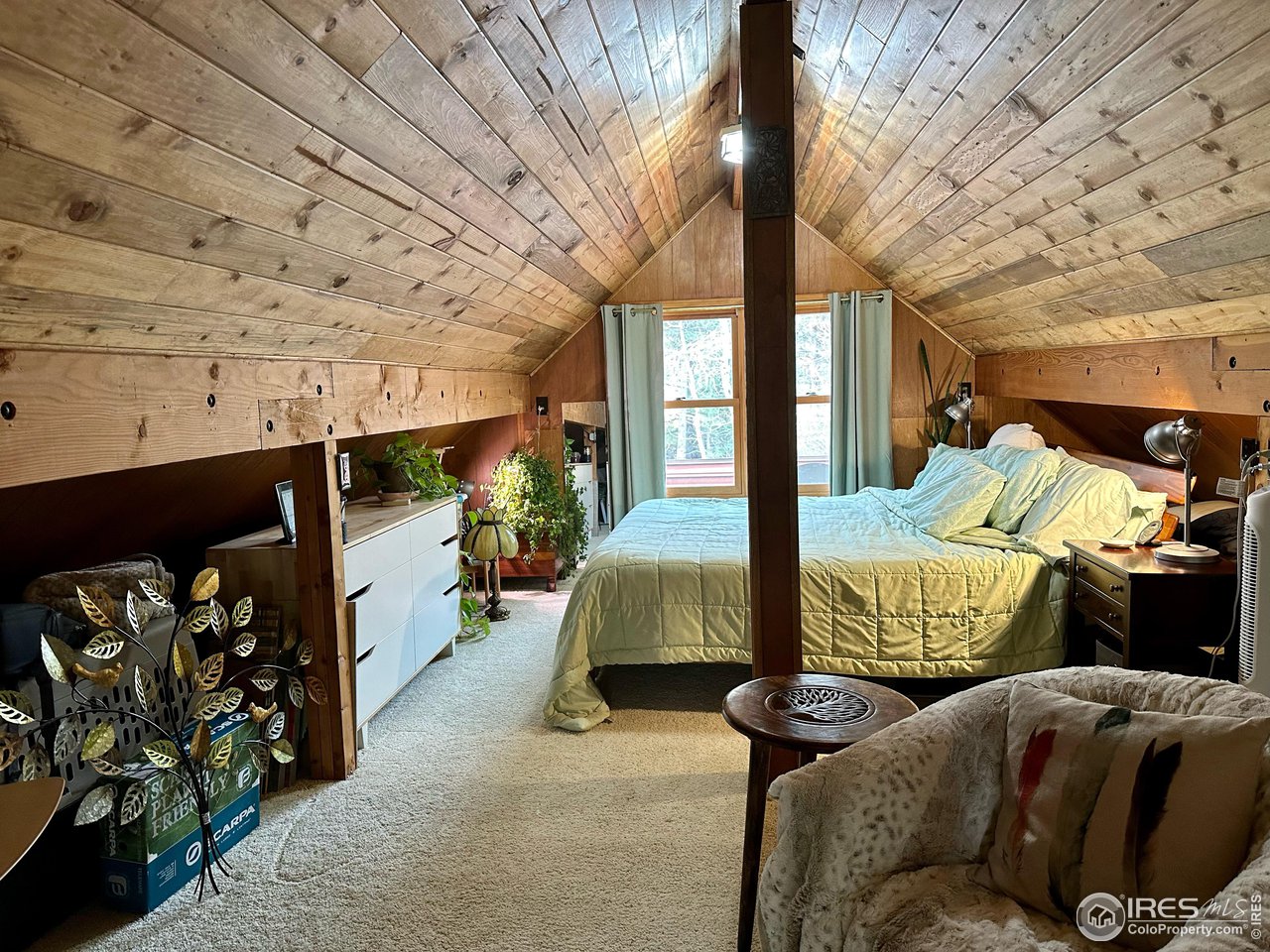 702 Riverside Drive Lyons, CO 80540 - Photo 7 of 19 a balcony with furniture