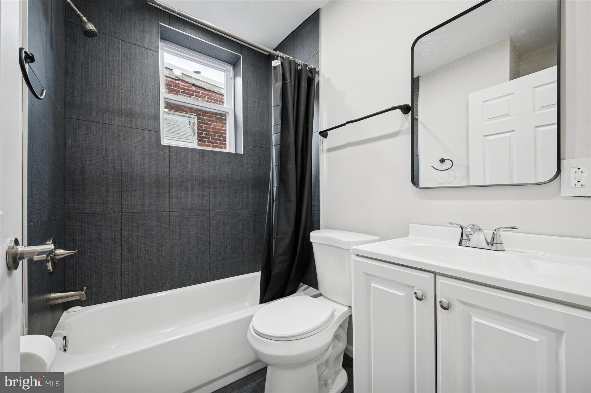 232 South Edgewood Street Philadelphia, PA 19139 - Photo 16 of 25 Modern bathroom with sleek finishes.