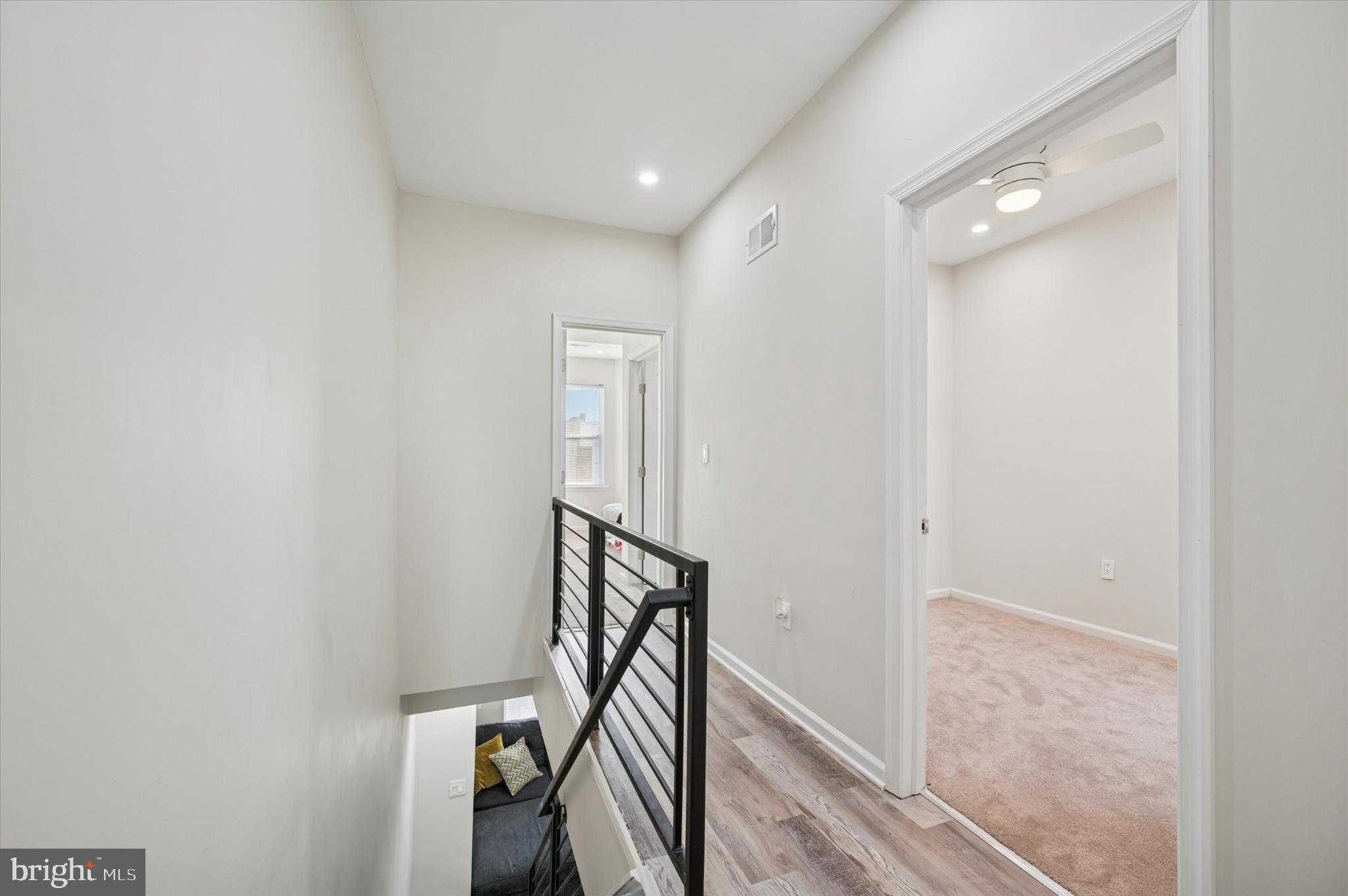 232 South Edgewood Street Philadelphia, PA 19139 - Photo 17 of 25 Modern hallway with sleek design elements.