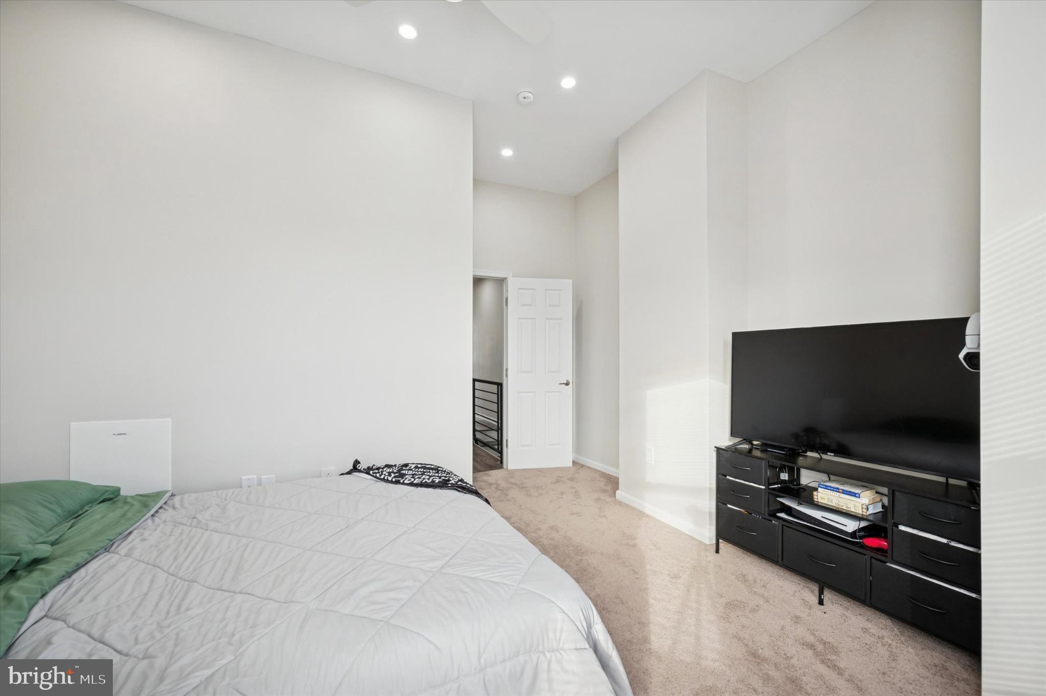 232 South Edgewood Street Philadelphia, PA 19139 - Photo 20 of 25 Spacious bedroom with modern design elements.