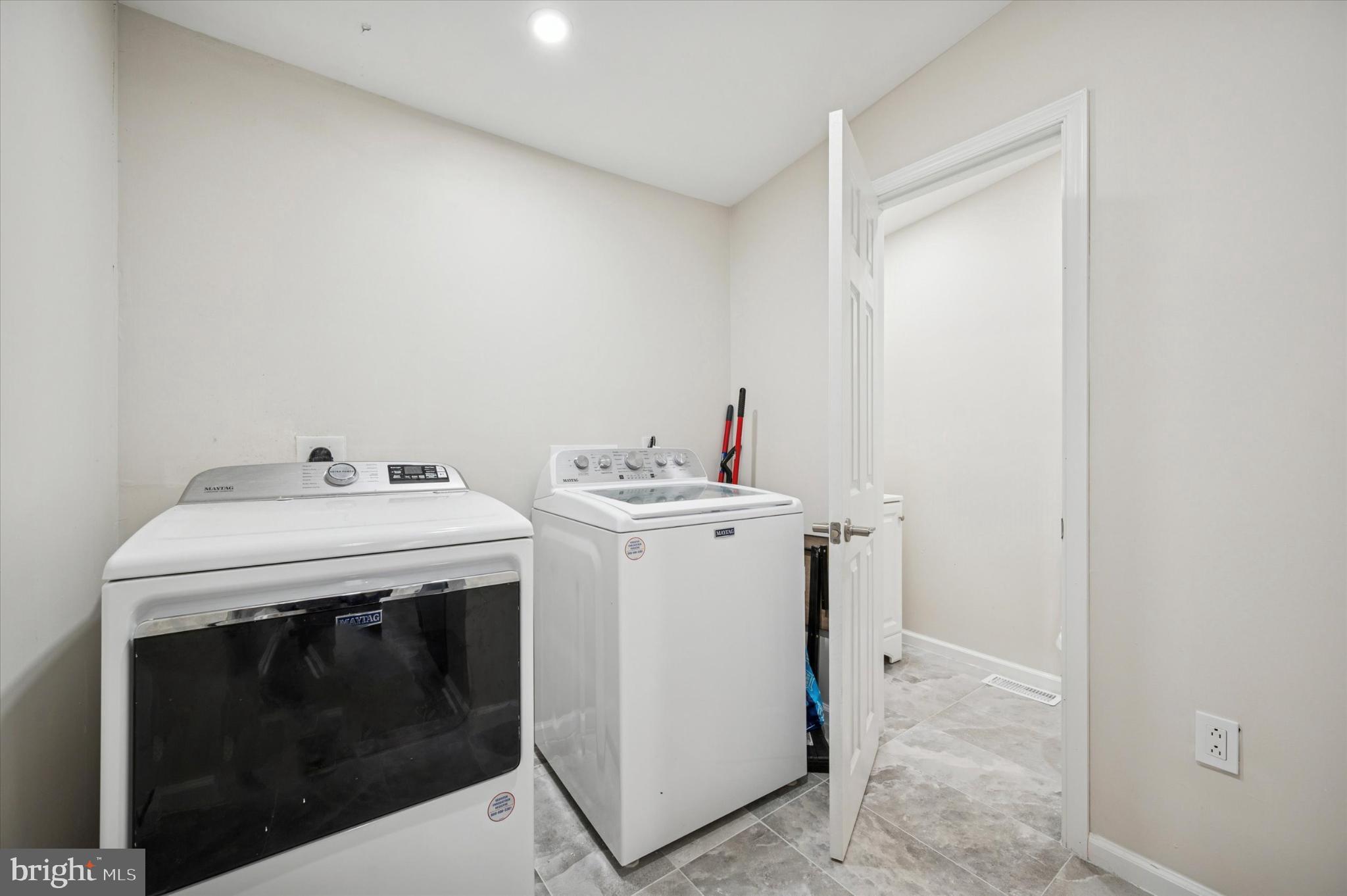 232 South Edgewood Street Philadelphia, PA 19139 - Photo 9 of 25 Bright and functional laundry space.