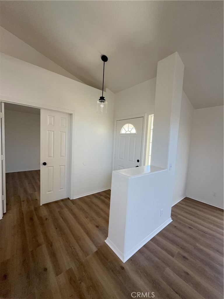 12590 Cobalt Road Victorville, CA 92392 - Photo 8 of 37 a view of a livingroom with wooden floor