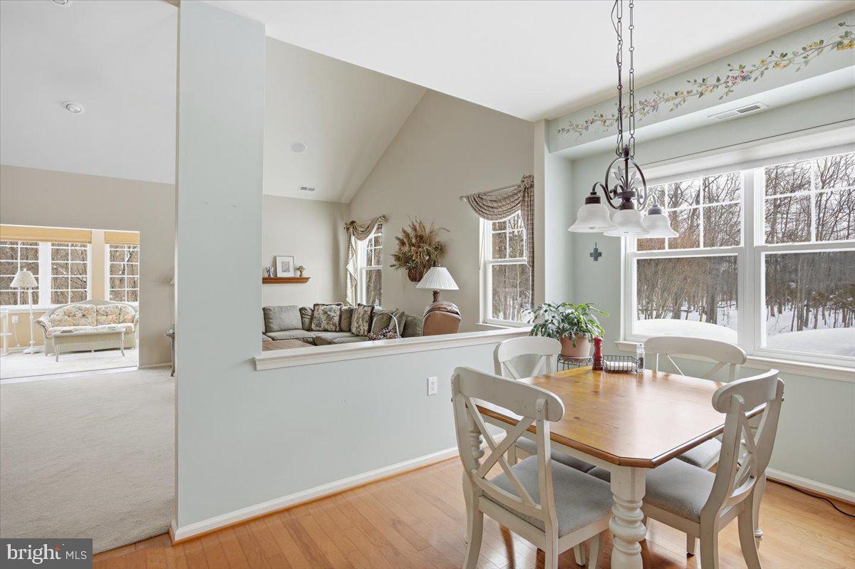 44 Mitchell Court Marlton, NJ 08053 - Photo 13 of 46 a dining room with furniture a chandelier and window